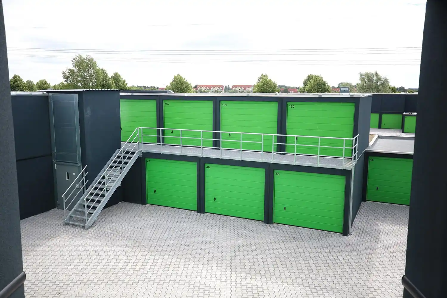 Two closed storage boxes and one open storage box for rent in Enschede.