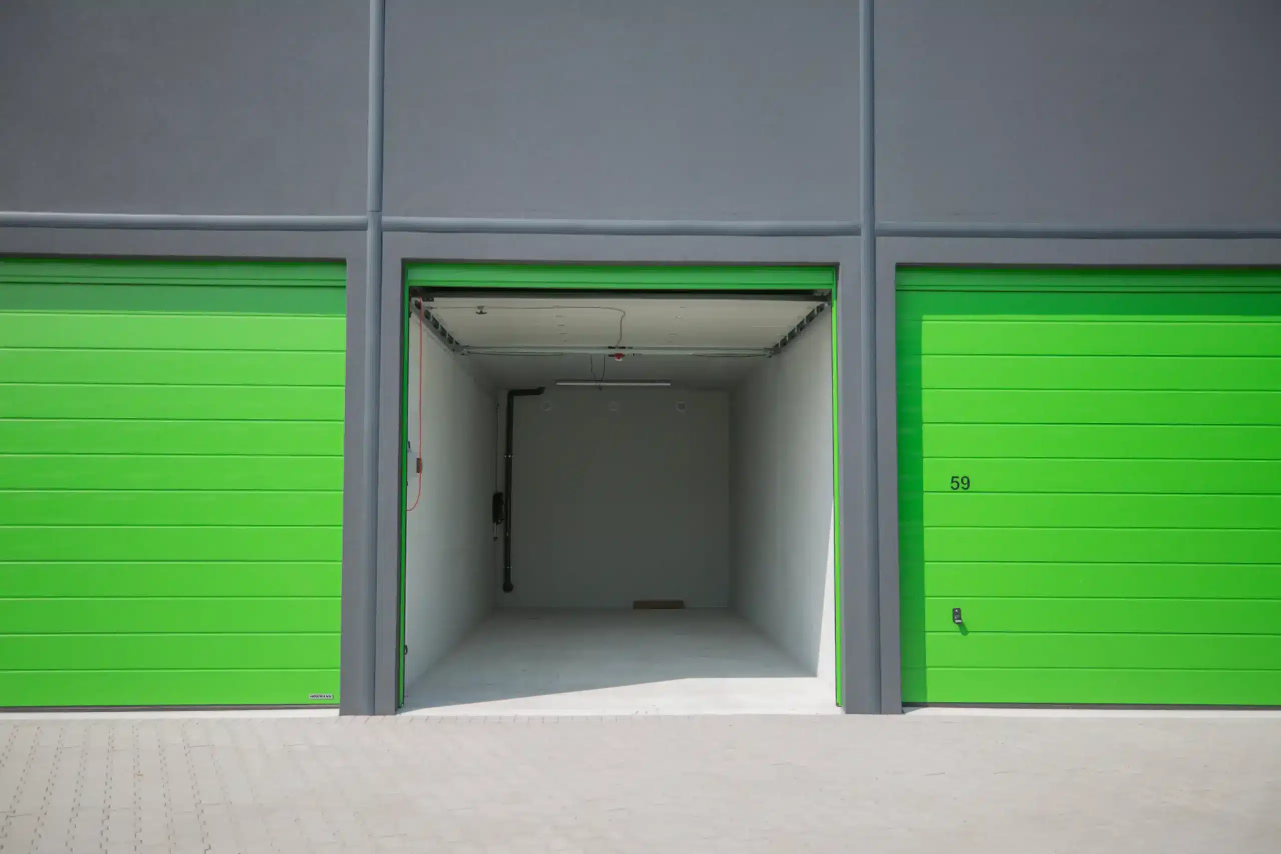 Two closed storage boxes and one open storage box for rent in Enschede.